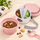 Pink lidded travel container with bowl, scoop and bag roll