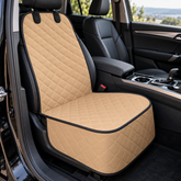 Tan quilted cover fitted on a car's front passenger seat