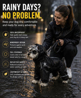 Owner and dark-coated dog wearing a black raincoat outdoors