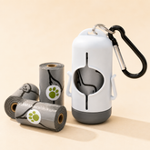 White and grey waste bag holder with clip and bag rolls