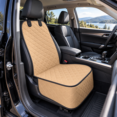 Tan dog seat cover installed on an empty front passenger seat